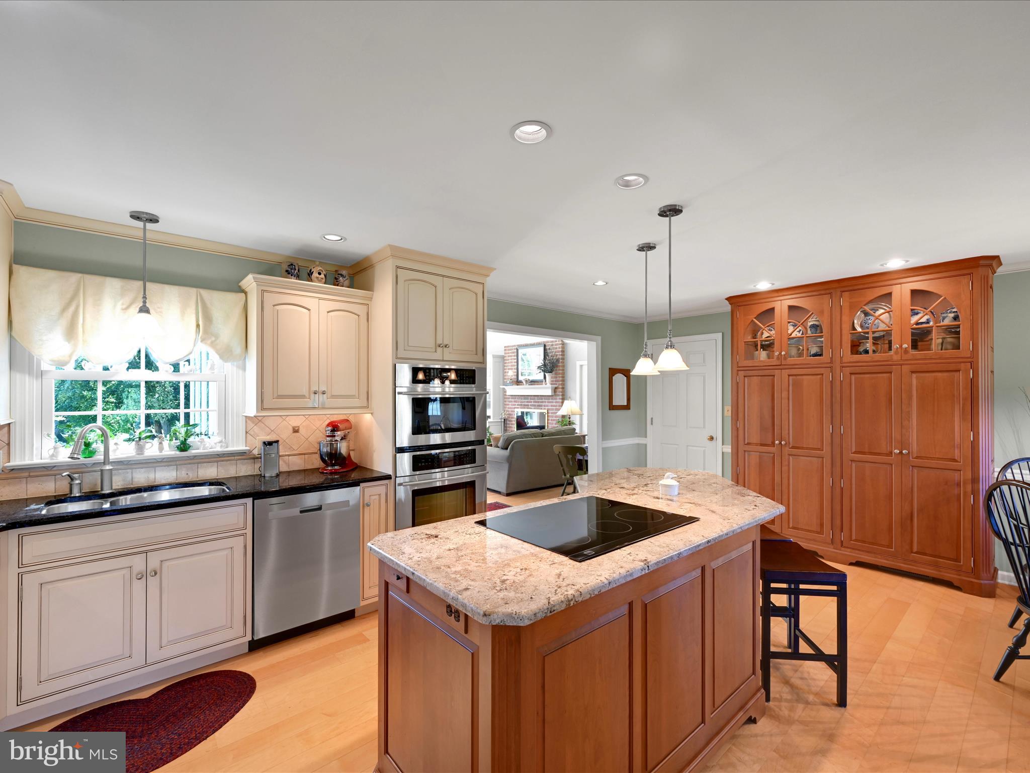 475 Sand Hill Road Pequea, PA 17565 - Photo 10 of 54 a kitchen with a sink a counter top space and stainless steel appliances