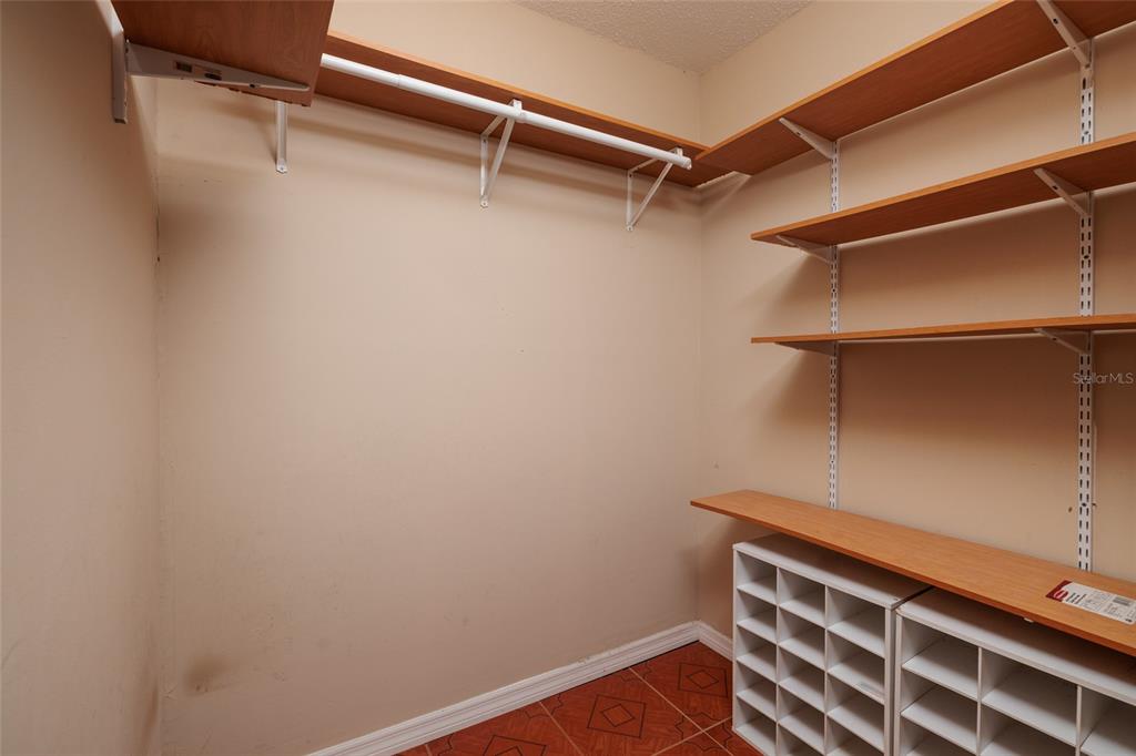 5409 Orange Blossom Road Pinellas Park, FL 33782 - Photo 16 of 30 a view of a room with racks on the wall