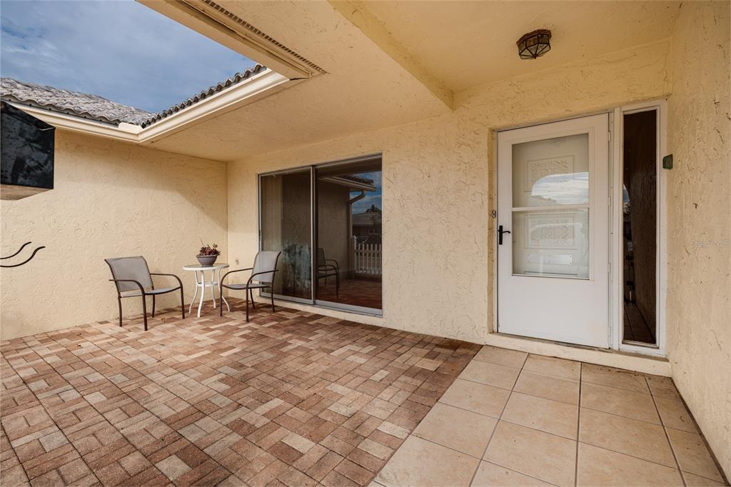5409 Orange Blossom Road Pinellas Park, FL 33782 - Photo 18 of 30 a view of a entryway with table and chairs