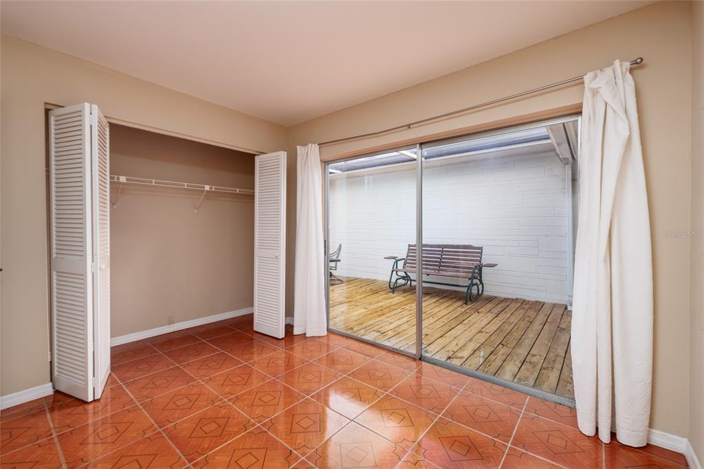 5409 Orange Blossom Road Pinellas Park, FL 33782 - Photo 19 of 30 a view of a bedroom with cabinet