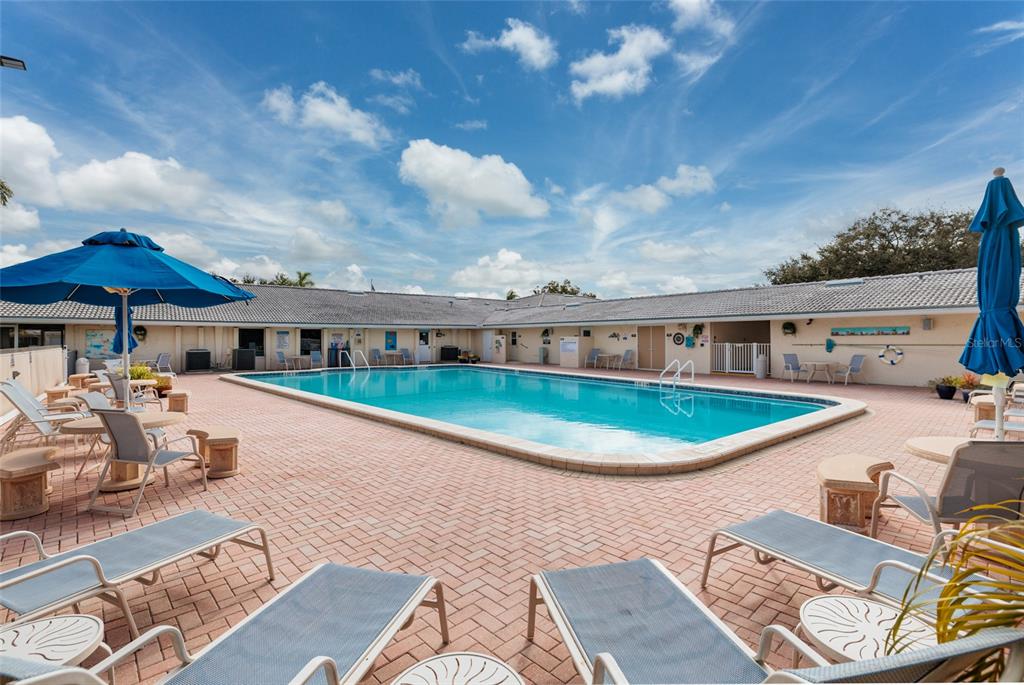 5409 Orange Blossom Road Pinellas Park, FL 33782 - Photo 24 of 30 swimming pool view with a seating space