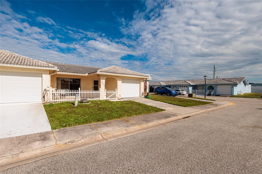 5409 Orange Blossom Road Pinellas Park, FL 33782 - Photo 30 of 30 front view of a house with a yard