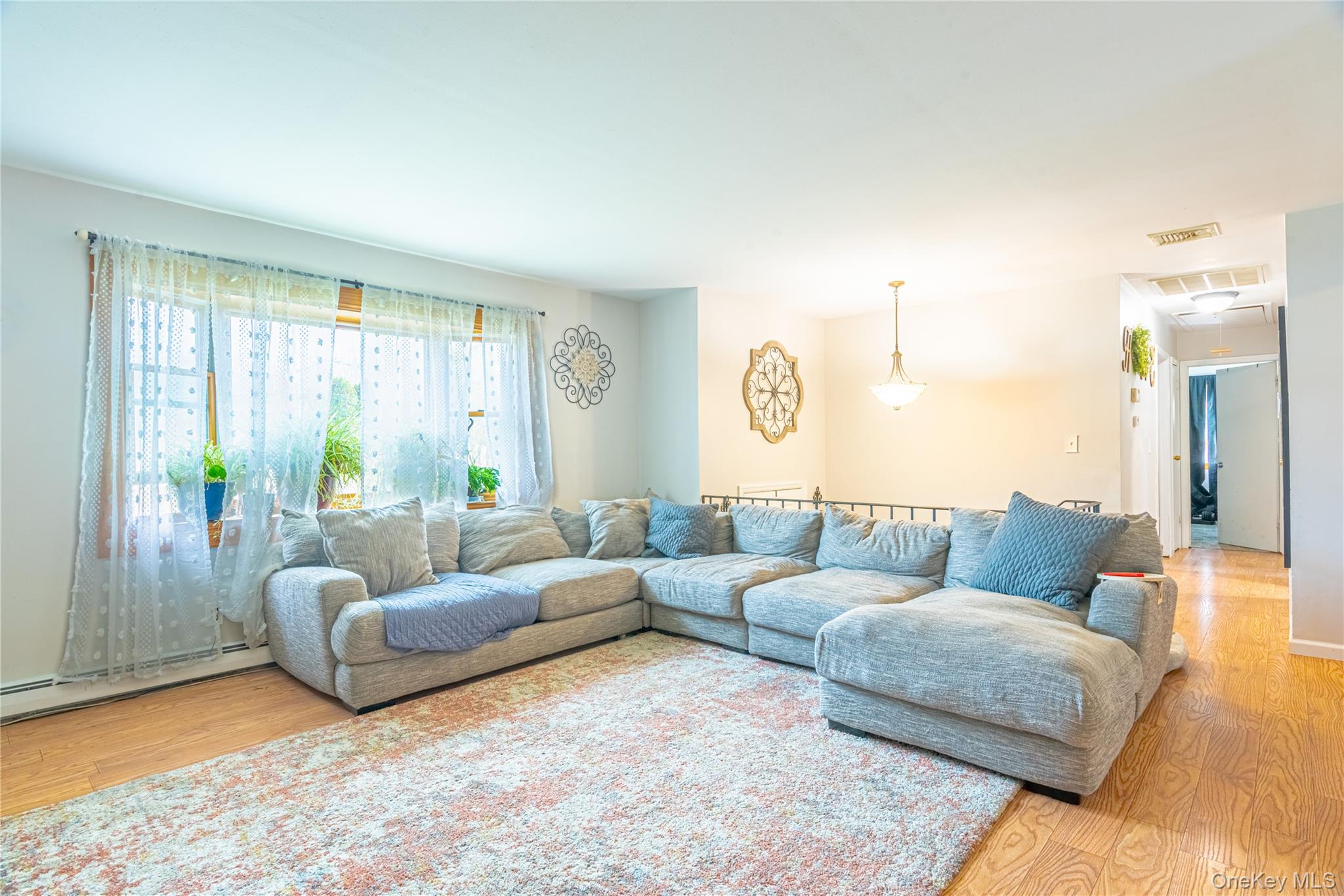 32 Deer Run Road Poughkeepsie, NY 12603 - Photo 11 of 30 a living room with furniture and a large window