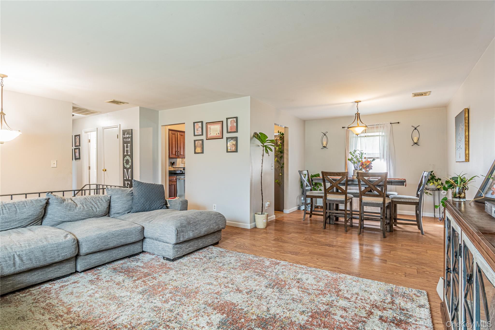 32 Deer Run Road Poughkeepsie, NY 12603 - Photo 12 of 30 a living room with furniture and wooden floor