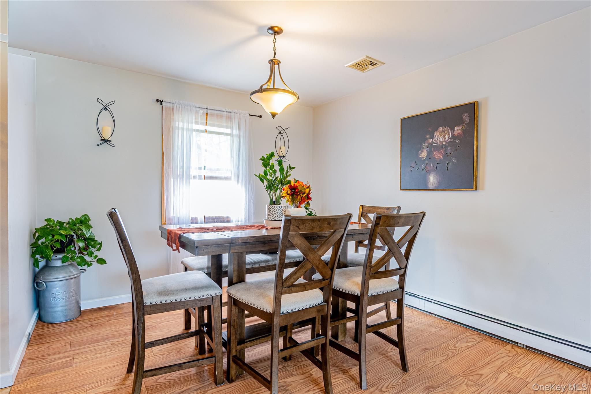 32 Deer Run Road Poughkeepsie, NY 12603 - Photo 13 of 30 a view of a dining room with furniture window and wooden floor