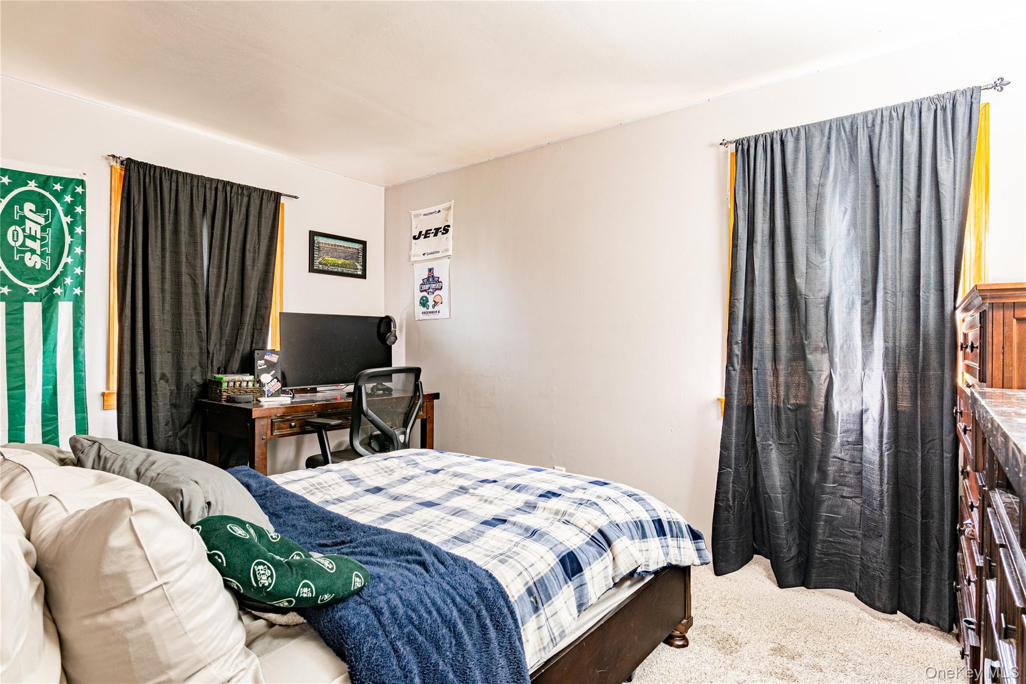 32 Deer Run Road Poughkeepsie, NY 12603 - Photo 21 of 30 a bedroom with a bed and a flat screen tv