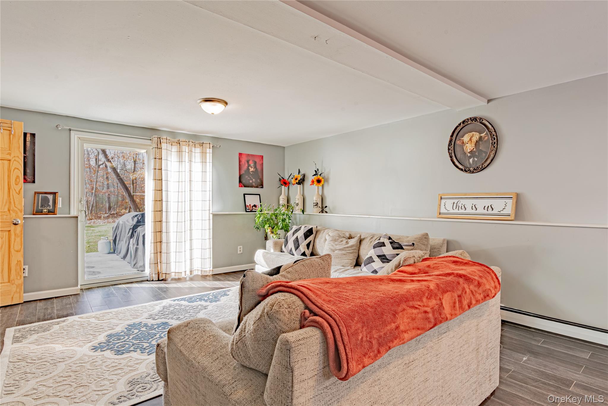 32 Deer Run Road Poughkeepsie, NY 12603 - Photo 24 of 30 a bedroom with a bed and wooden floor