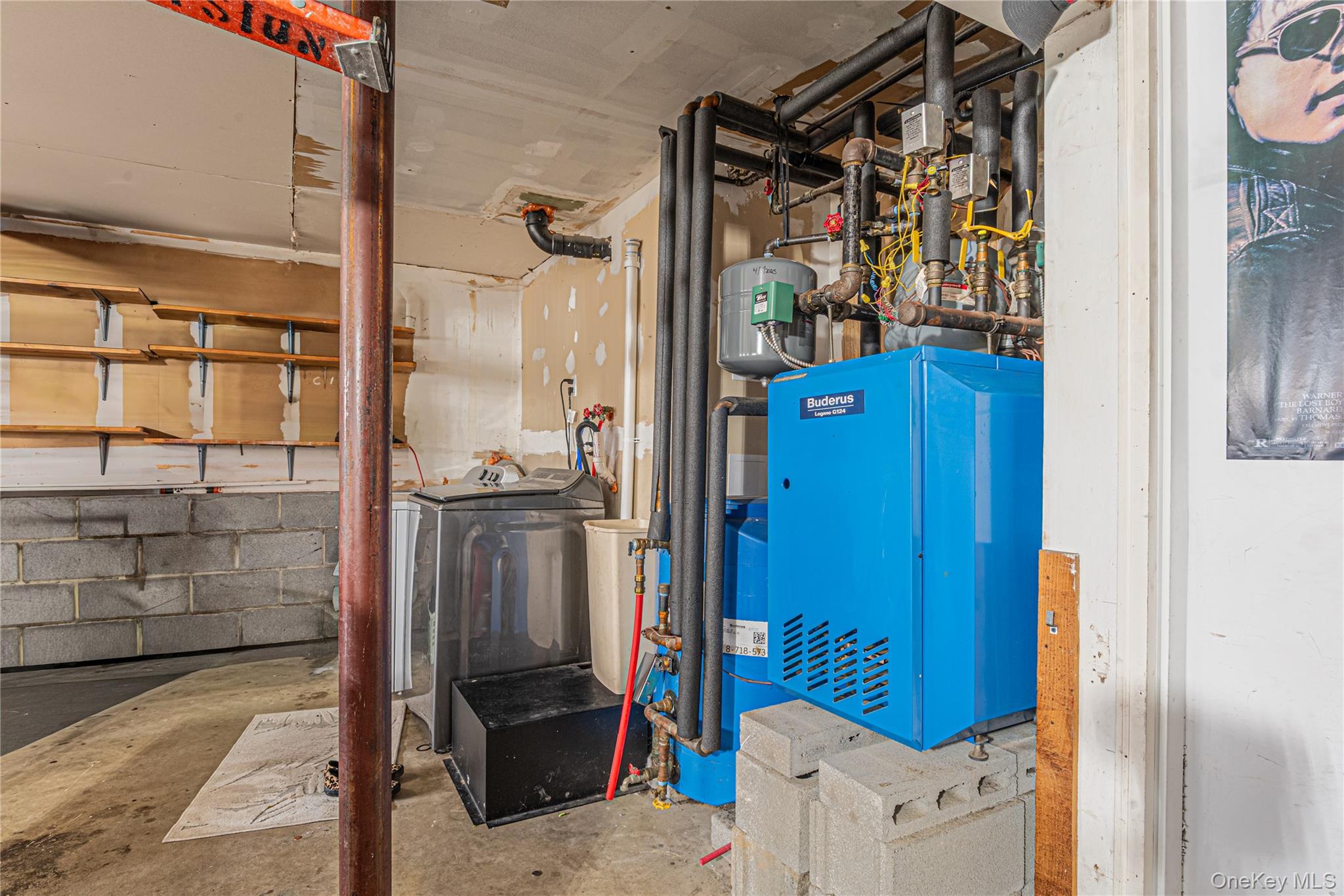 32 Deer Run Road Poughkeepsie, NY 12603 - Photo 30 of 30 a view of walk in closet with clothes and shoes