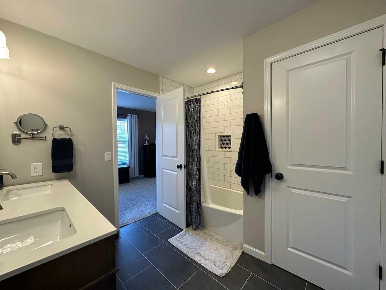 1401 Potomac Court Geneva, IL 60134 - Photo 15 of 18 a bathroom with a sink and mirror
