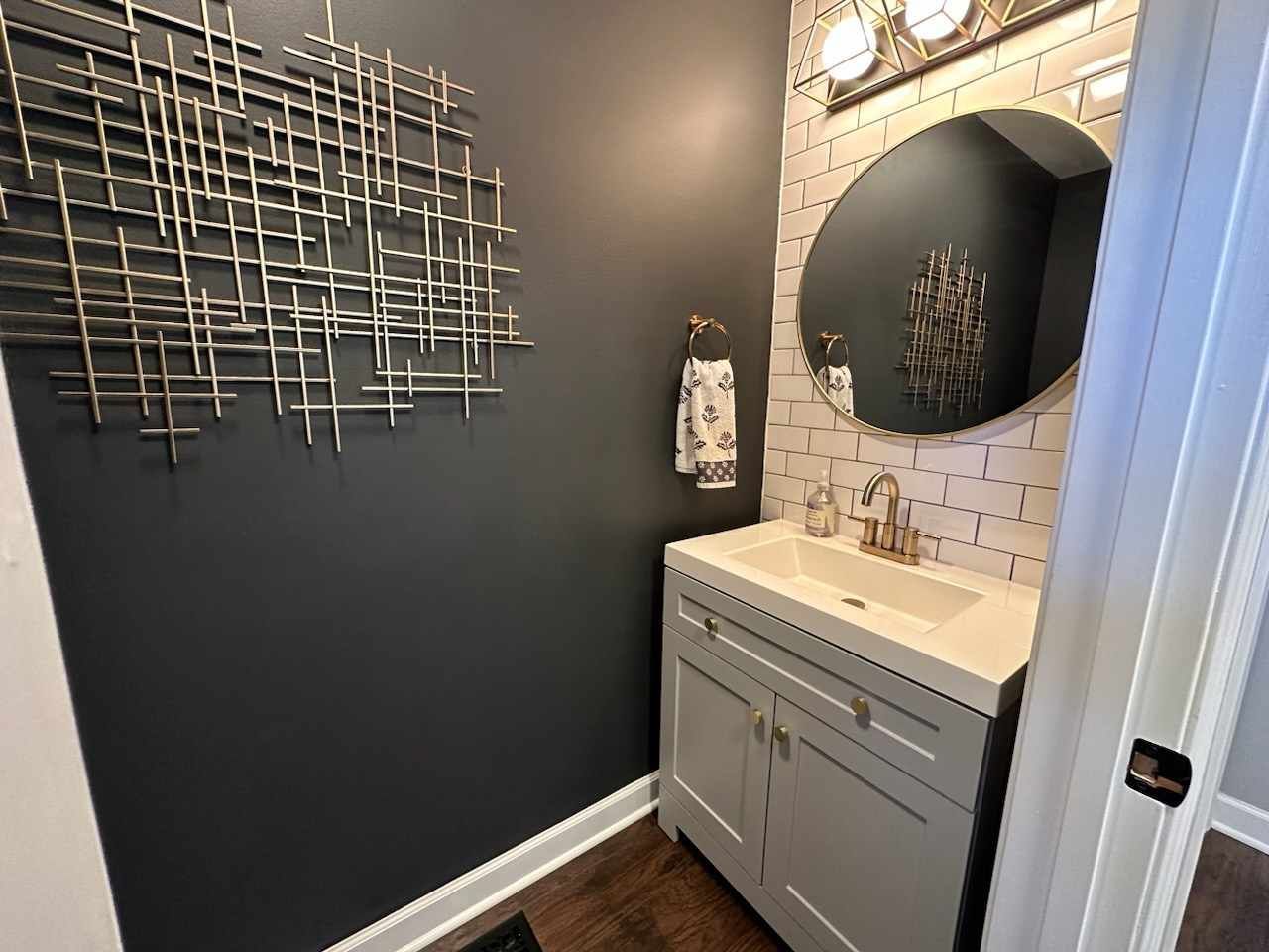 1401 Potomac Court Geneva, IL 60134 - Photo 7 of 18 a bathroom with a sink and a mirror