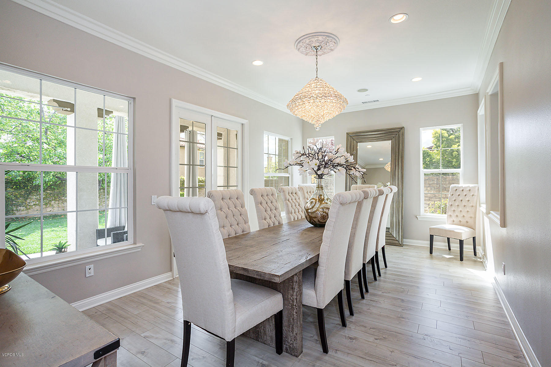 2734 Forest Grove Lane Simi Valley, CA 93065 - Photo 15 of 57 a view of a dining room with furniture wooden floor and chandelier