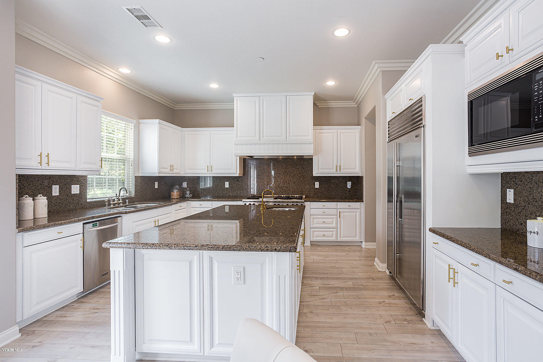2734 Forest Grove Lane Simi Valley, CA 93065 - Photo 16 of 57 a large kitchen with granite countertop lots of counter top space