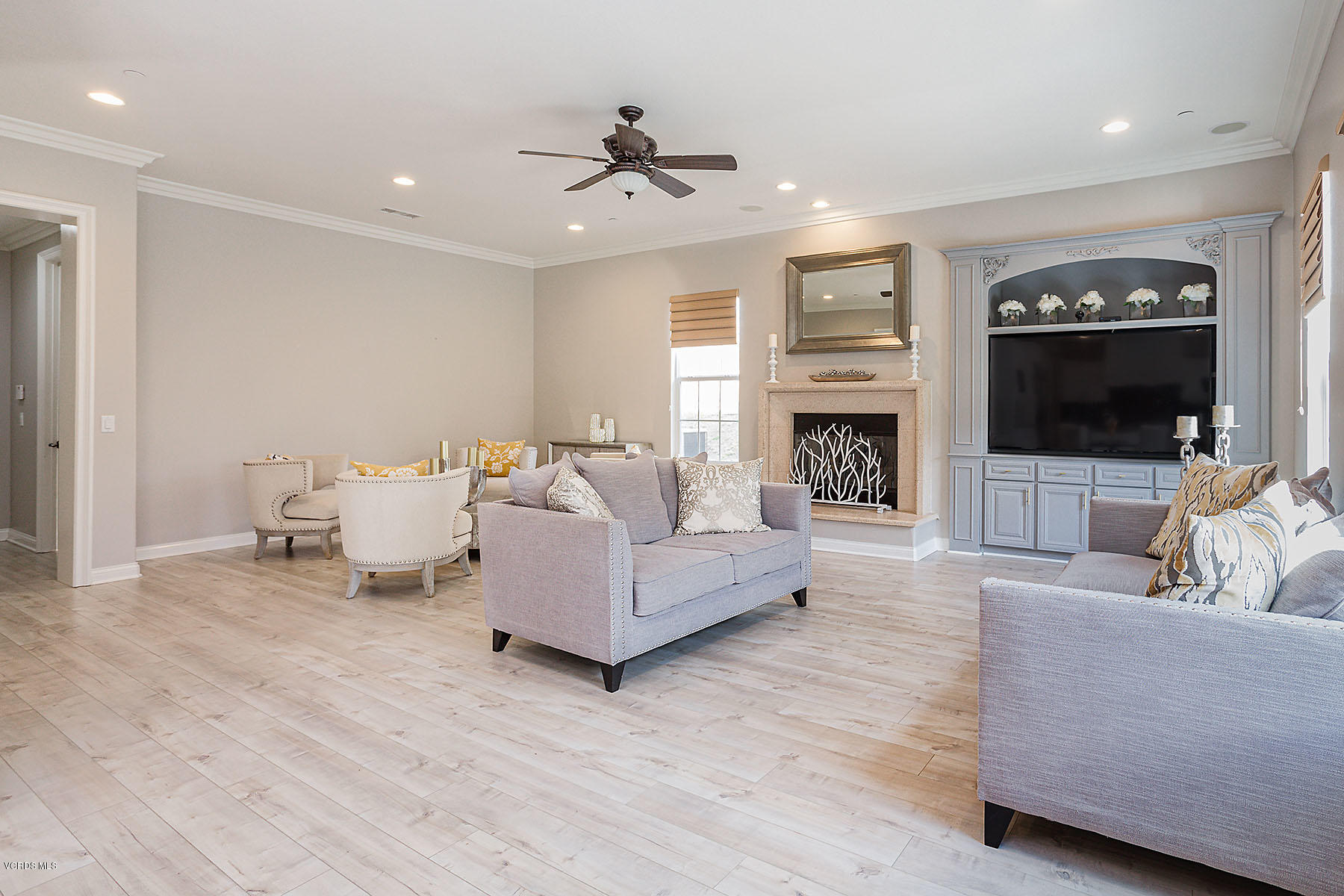 2734 Forest Grove Lane Simi Valley, CA 93065 - Photo 21 of 57 a living room with furniture and a fireplace