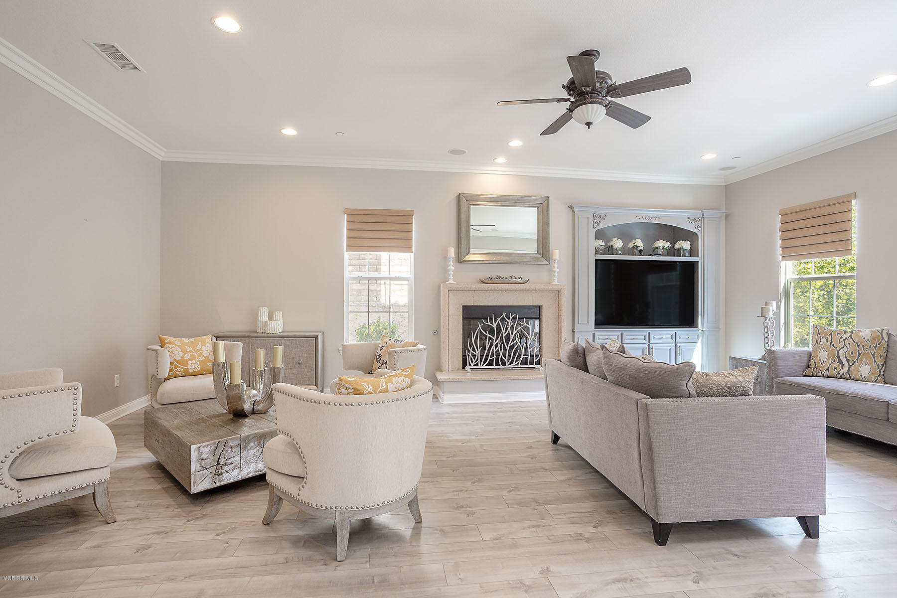 2734 Forest Grove Lane Simi Valley, CA 93065 - Photo 23 of 57 a living room with furniture and a fireplace