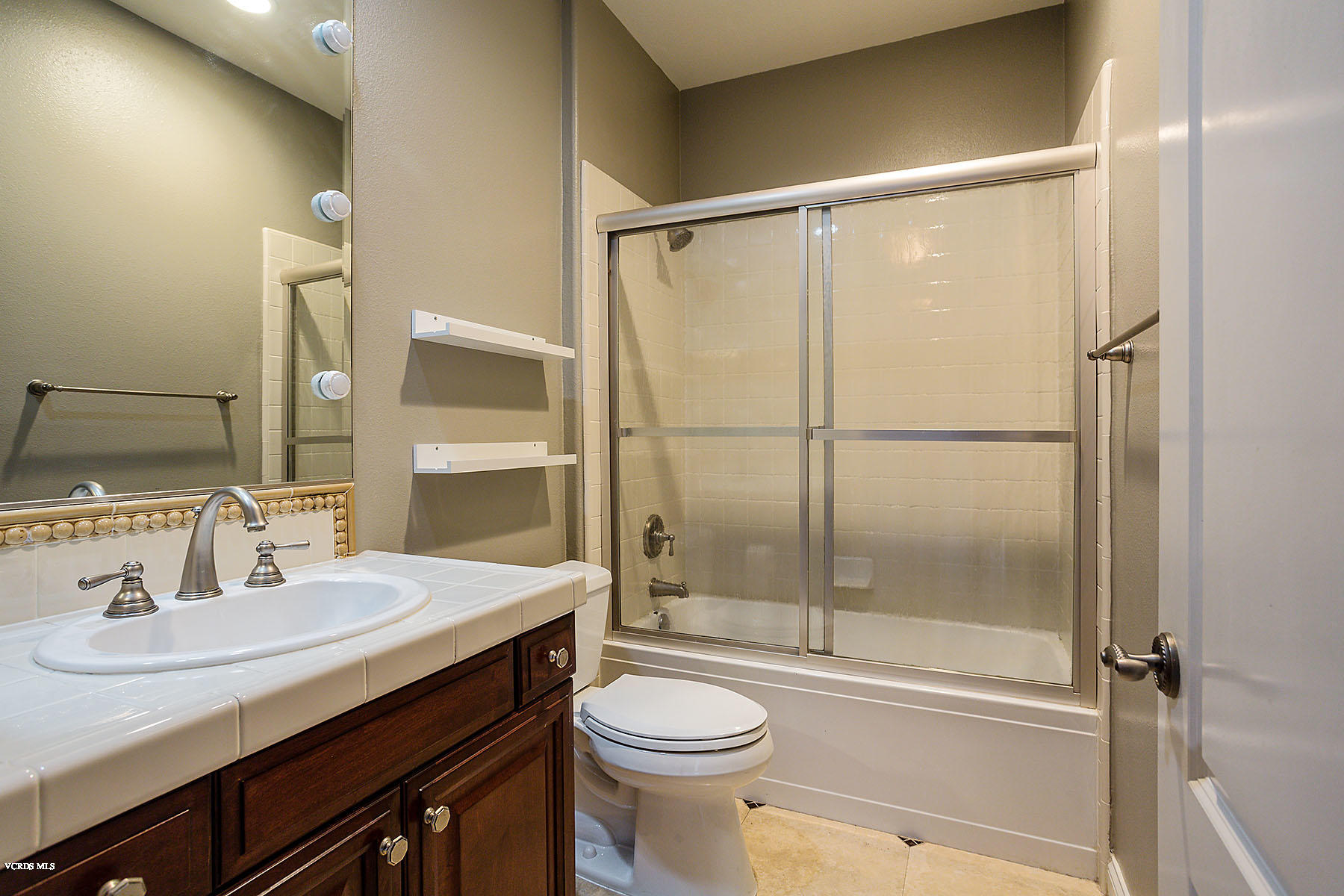 2734 Forest Grove Lane Simi Valley, CA 93065 - Photo 27 of 57 a bathroom with a sink toilet and shower