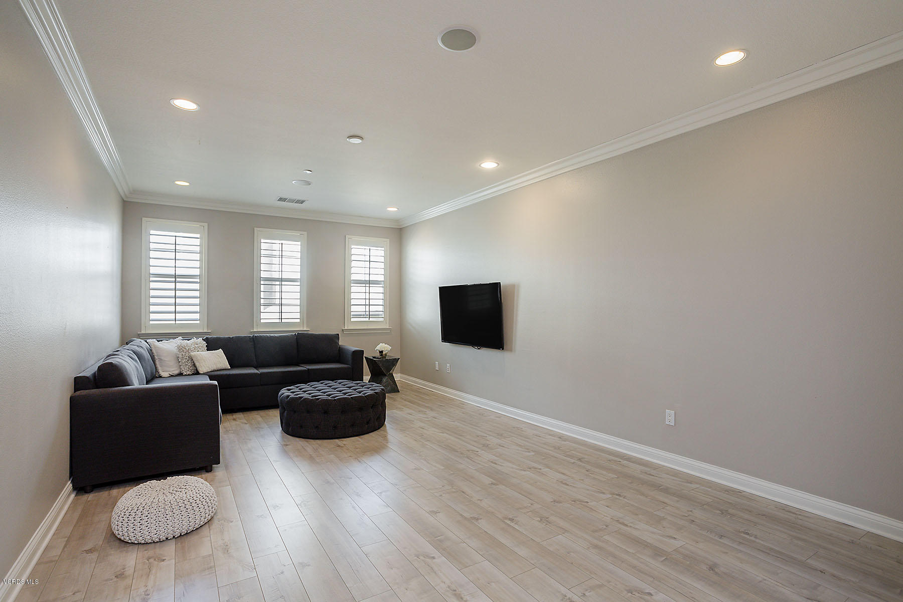 2734 Forest Grove Lane Simi Valley, CA 93065 - Photo 29 of 57 a living room with furniture and a flat screen tv