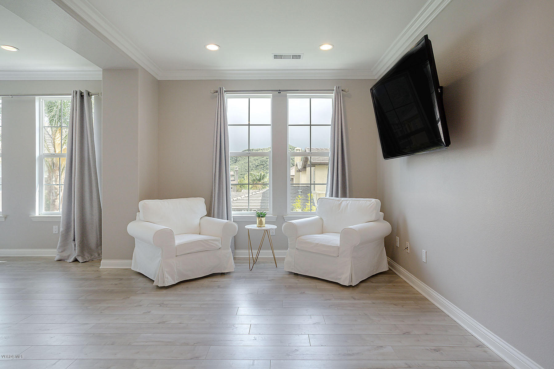 2734 Forest Grove Lane Simi Valley, CA 93065 - Photo 31 of 57 a living room with fireplace furniture and a flat screen tv