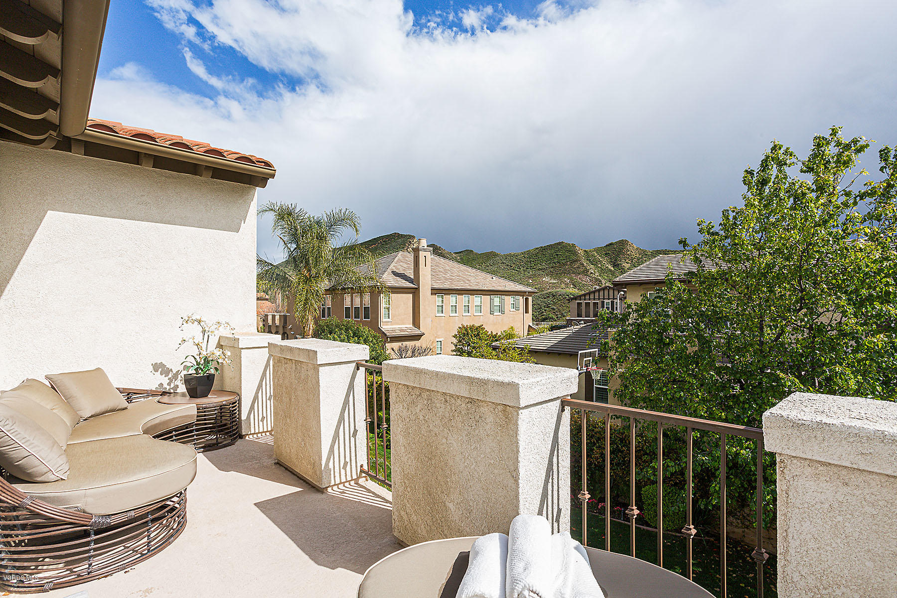 2734 Forest Grove Lane Simi Valley, CA 93065 - Photo 35 of 57 a view of a chairs and table in the balcony