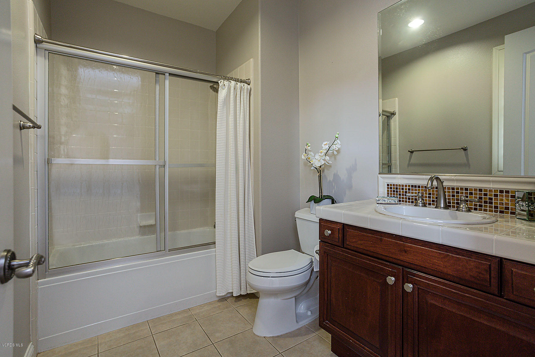 2734 Forest Grove Lane Simi Valley, CA 93065 - Photo 42 of 57 a bathroom with a granite countertop sink toilet and shower