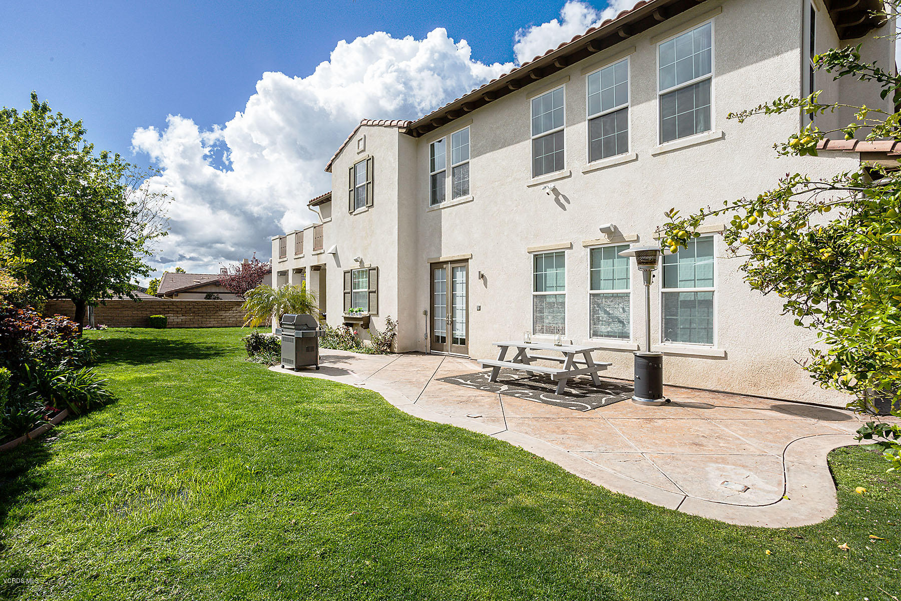 2734 Forest Grove Lane Simi Valley, CA 93065 - Photo 45 of 57 a view of a house with backyard and sitting area