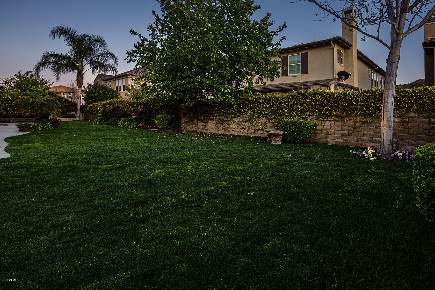 2734 Forest Grove Lane Simi Valley, CA 93065 - Photo 48 of 57 a front view of a house with a garden