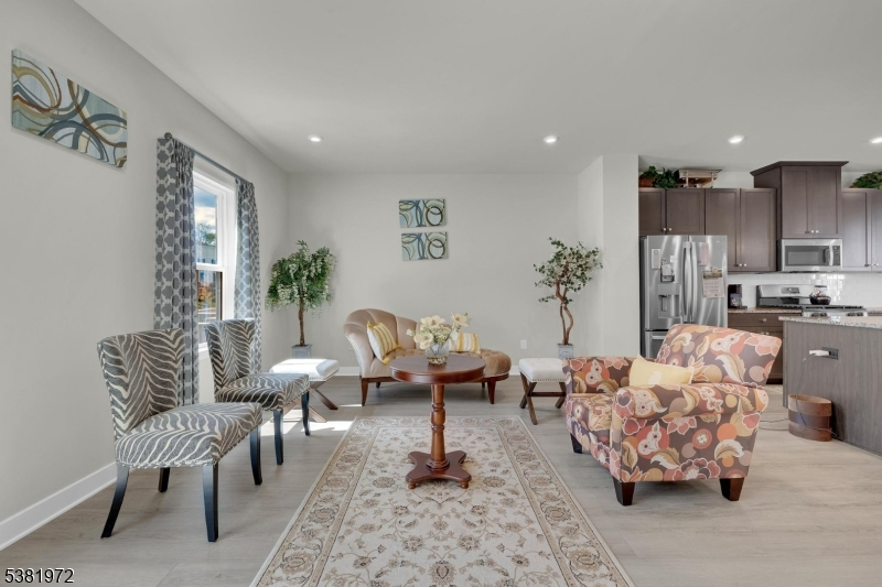 20 Peckwell Street Budd Lake, NJ 07828 - Photo 13 of 39 a living room with furniture and a view of kitchen