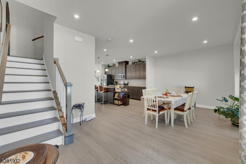 20 Peckwell Street Budd Lake, NJ 07828 - Photo 16 of 39 a view of a dining room with furniture and wooden floor