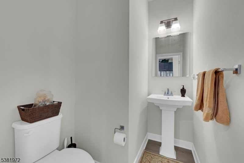 20 Peckwell Street Budd Lake, NJ 07828 - Photo 17 of 39 a bathroom with a sink toilet and mirror