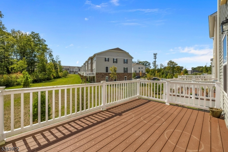20 Peckwell Street Budd Lake, NJ 07828 - Photo 19 of 39 a view of a balcony with wooden floor