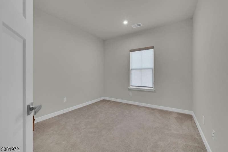 20 Peckwell Street Budd Lake, NJ 07828 - Photo 27 of 39 an empty room with a window