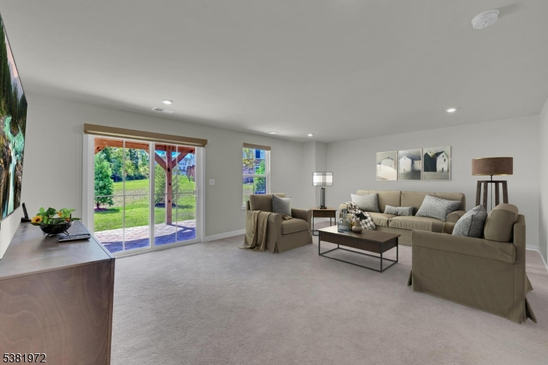 20 Peckwell Street Budd Lake, NJ 07828 - Photo 30 of 39 a living room with furniture and large windows