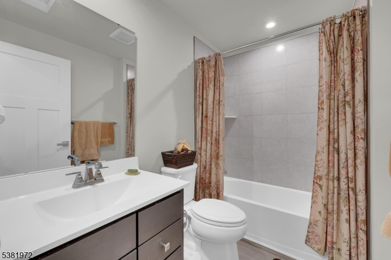 20 Peckwell Street Budd Lake, NJ 07828 - Photo 31 of 39 a bathroom with a sink toilet and shower