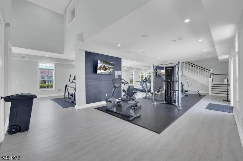 20 Peckwell Street Budd Lake, NJ 07828 - Photo 34 of 39 a living room with furniture and a flat screen tv