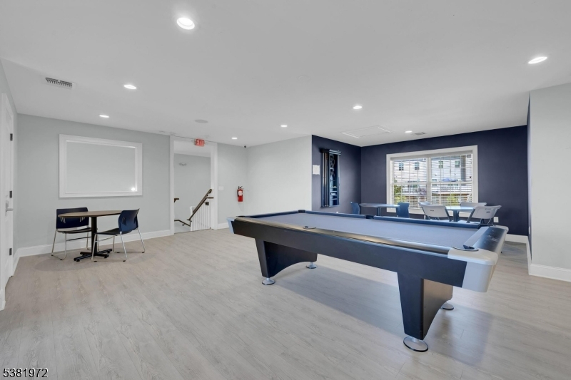 20 Peckwell Street Budd Lake, NJ 07828 - Photo 36 of 39 a living room with furniture a large window and furniture