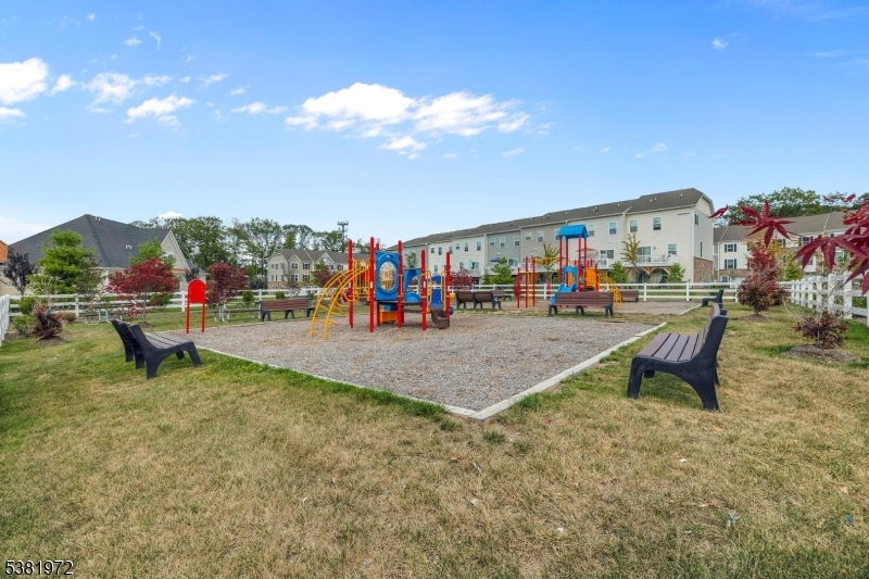 20 Peckwell Street Budd Lake, NJ 07828 - Photo 39 of 39 a view of a swimming pool with a bench and a lake view