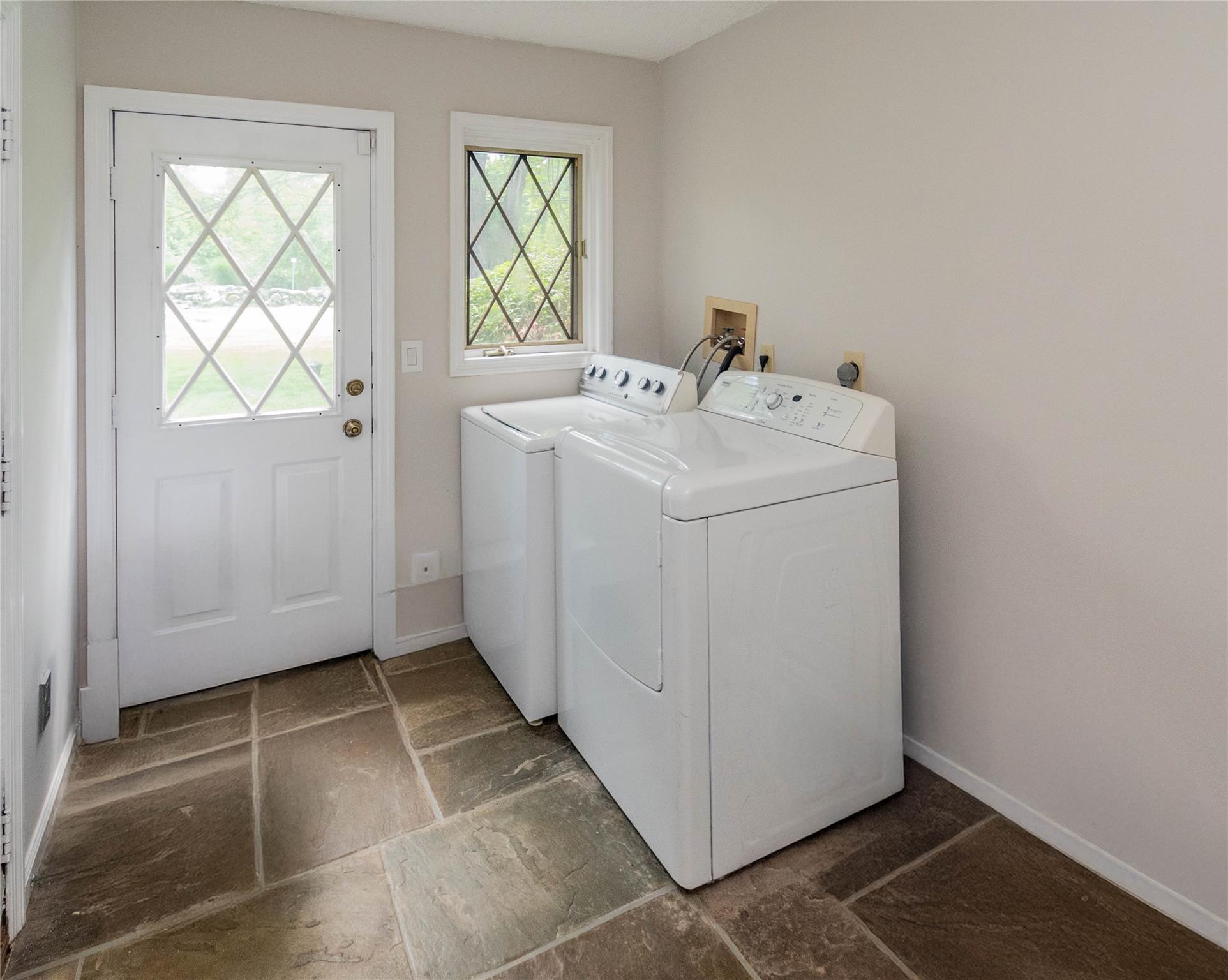 7 Fox Hollow Road Brewster, NY 10509 - Photo 17 of 33 a utility room with a window dryer and washer
