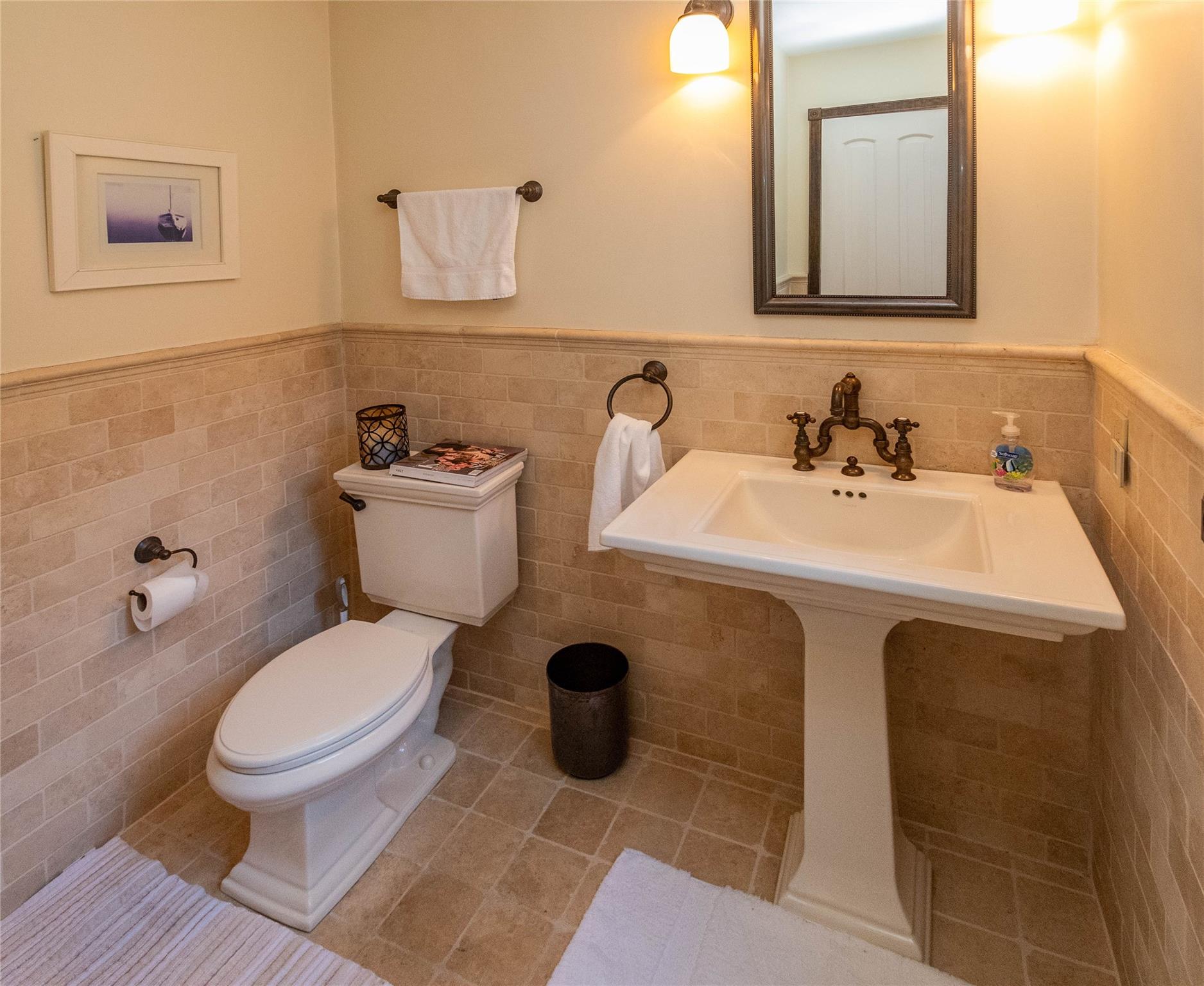 7 Fox Hollow Road Brewster, NY 10509 - Photo 23 of 33 a bathroom with a toilet sink and mirror