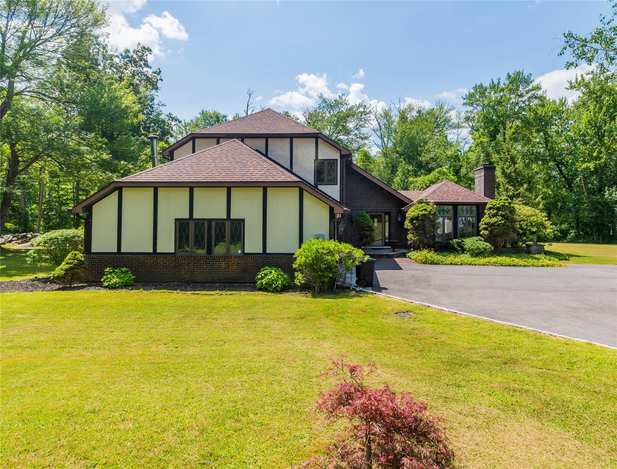 7 Fox Hollow Road Brewster, NY 10509 - Photo 3 of 33 a view of a house with a swimming pool