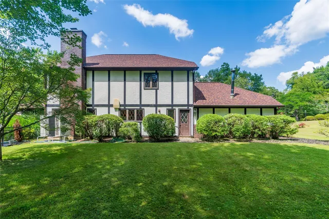 a view of a house with a garden