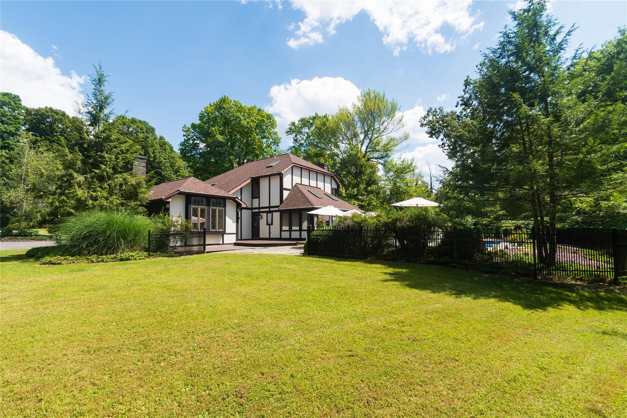 7 Fox Hollow Road Brewster, NY 10509 - Photo 6 of 33 a front view of a house with yard and swimming pool
