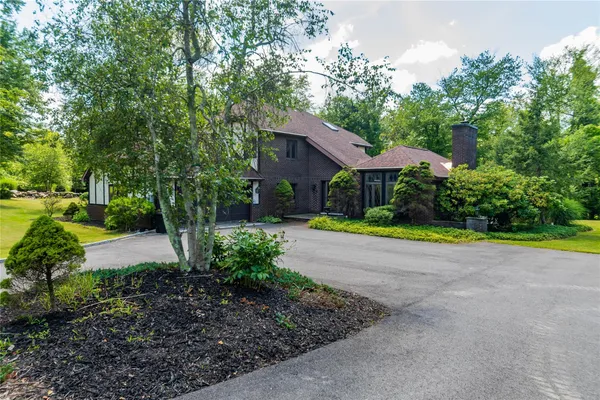 a view of a house with garden