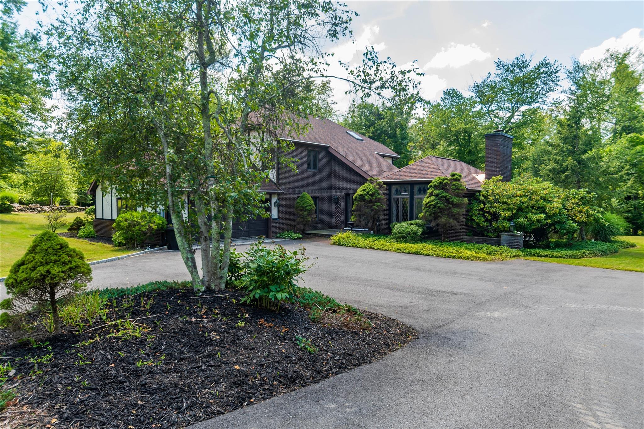 7 Fox Hollow Road Brewster, NY 10509 - Photo 7 of 33 a view of a house with garden