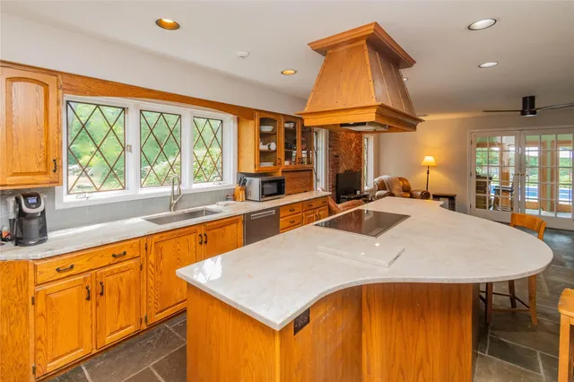 a very nice looking kitchen with a large window