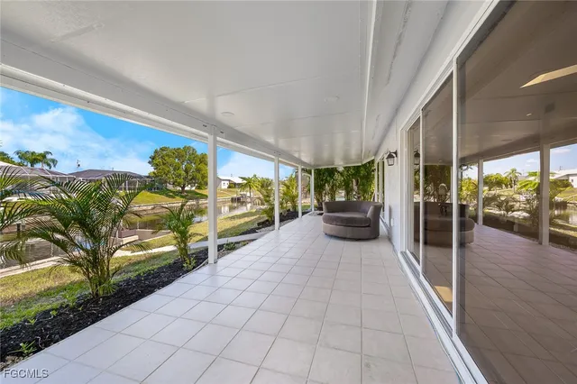 a view of a porch with furniture