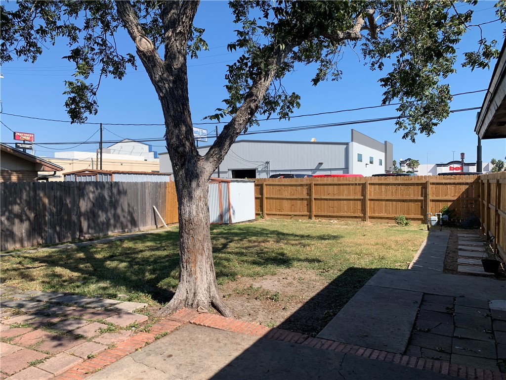 1601 West Manor Drive Corpus Christi, TX 78411 - Photo 24 of 25 a view of a backyard with wooden fence