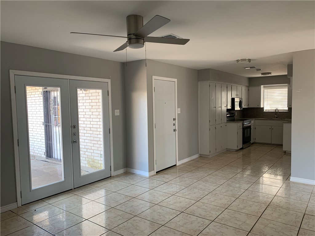 1601 West Manor Drive Corpus Christi, TX 78411 - Photo 10 of 25 a view of a kitchen and window