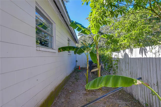 a view of a house with a flower garden