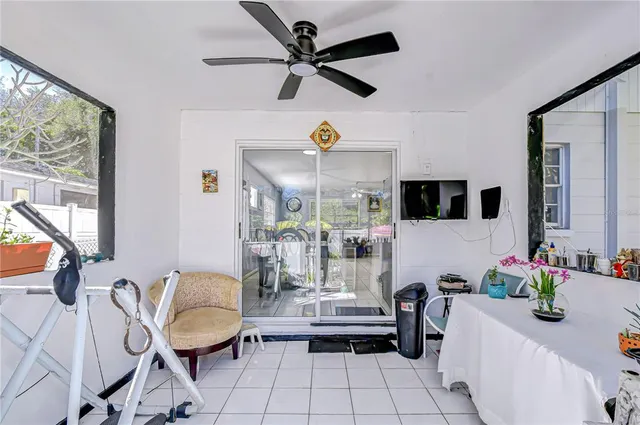 a living room with furniture and a window