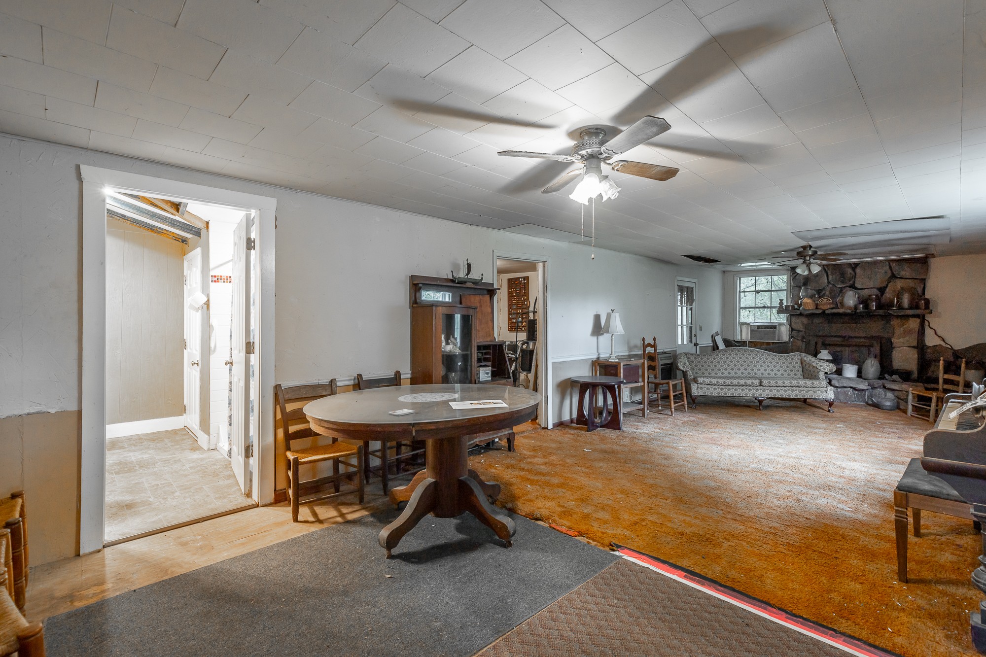 2419 Maple Street Chattanooga, TN 37406 - Photo 17 of 32 a living room with furniture a table and wooden floor