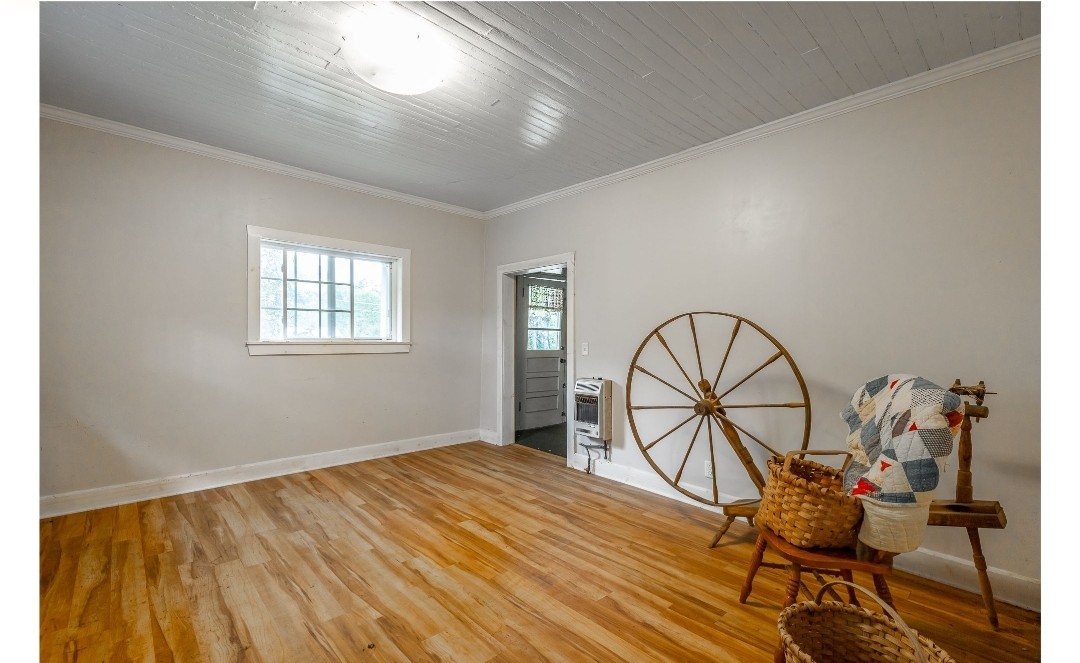 2419 Maple Street Chattanooga, TN 37406 - Photo 22 of 32 a view of a livingroom with wooden floor and furniture